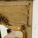 Miroir de style Louis XV en bois et stuc doré XX siècle