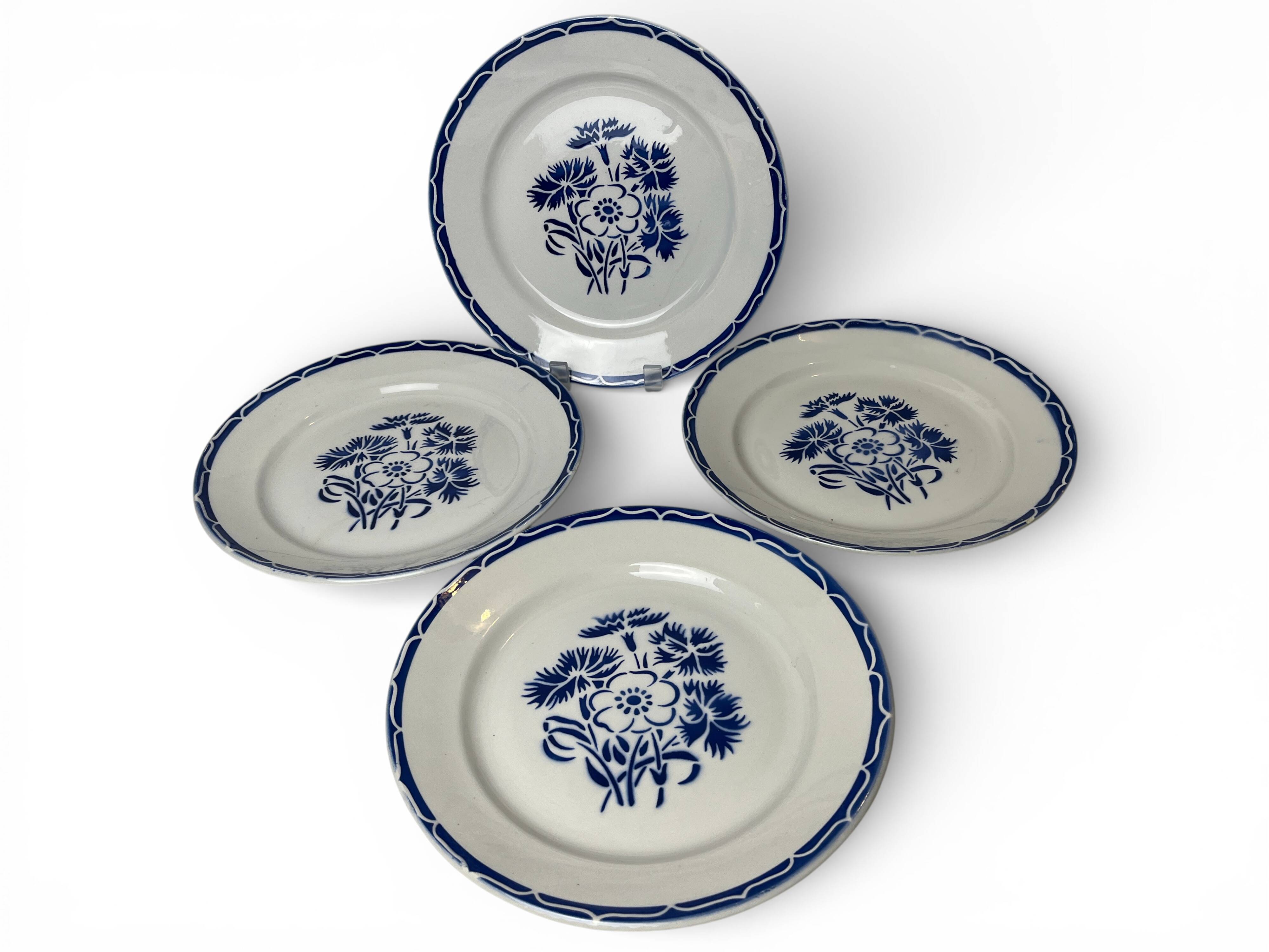 Set of four Lunéville KG plates model Annecy from around 1930.