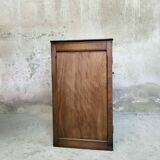 Small wooden sideboard with two doors.