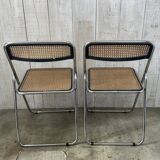 Pair of chrome and cane folding chairs