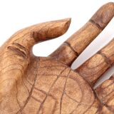 Empty wooden pocket in the shape of a hand, vintage