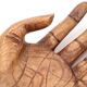 Empty wooden pocket in the shape of a hand, vintage