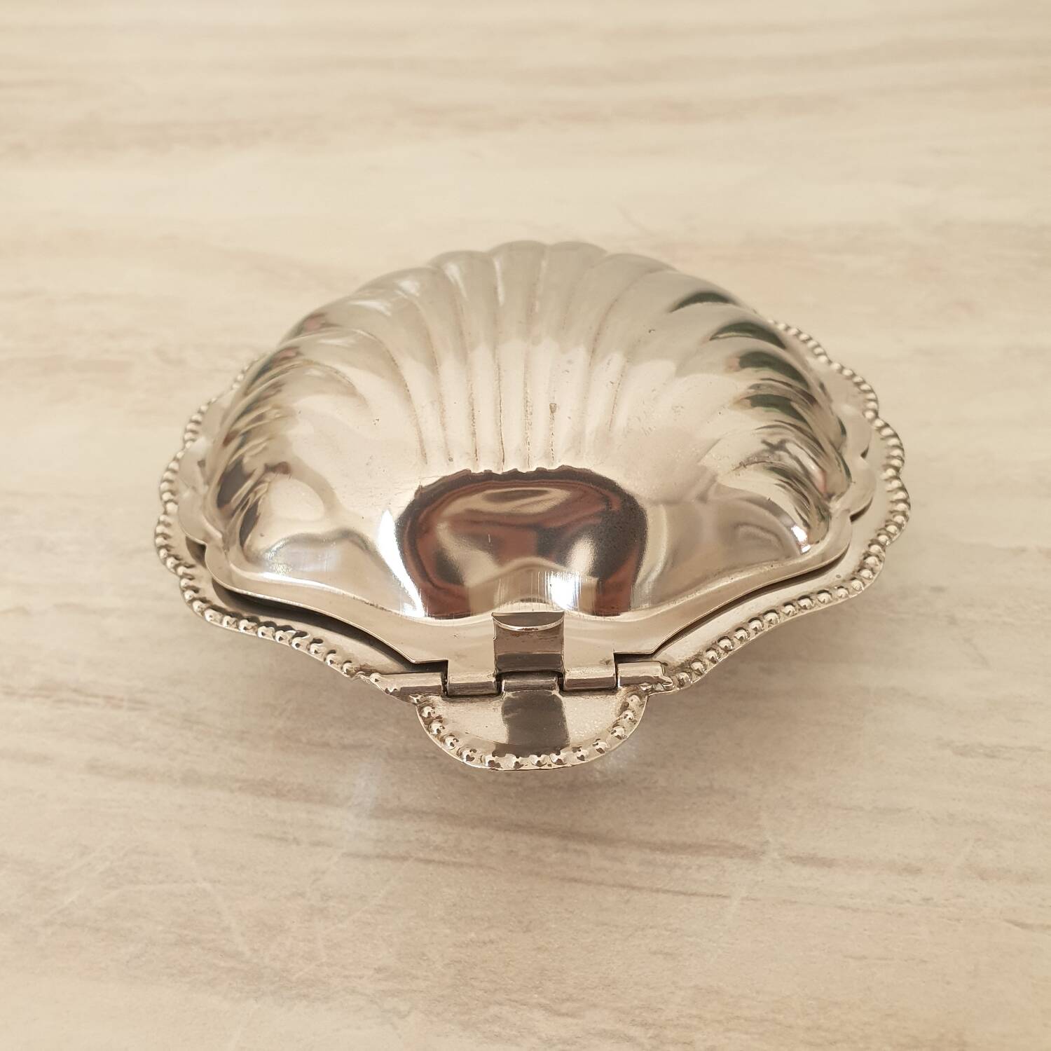 Stainless steel and glass shell butter dish