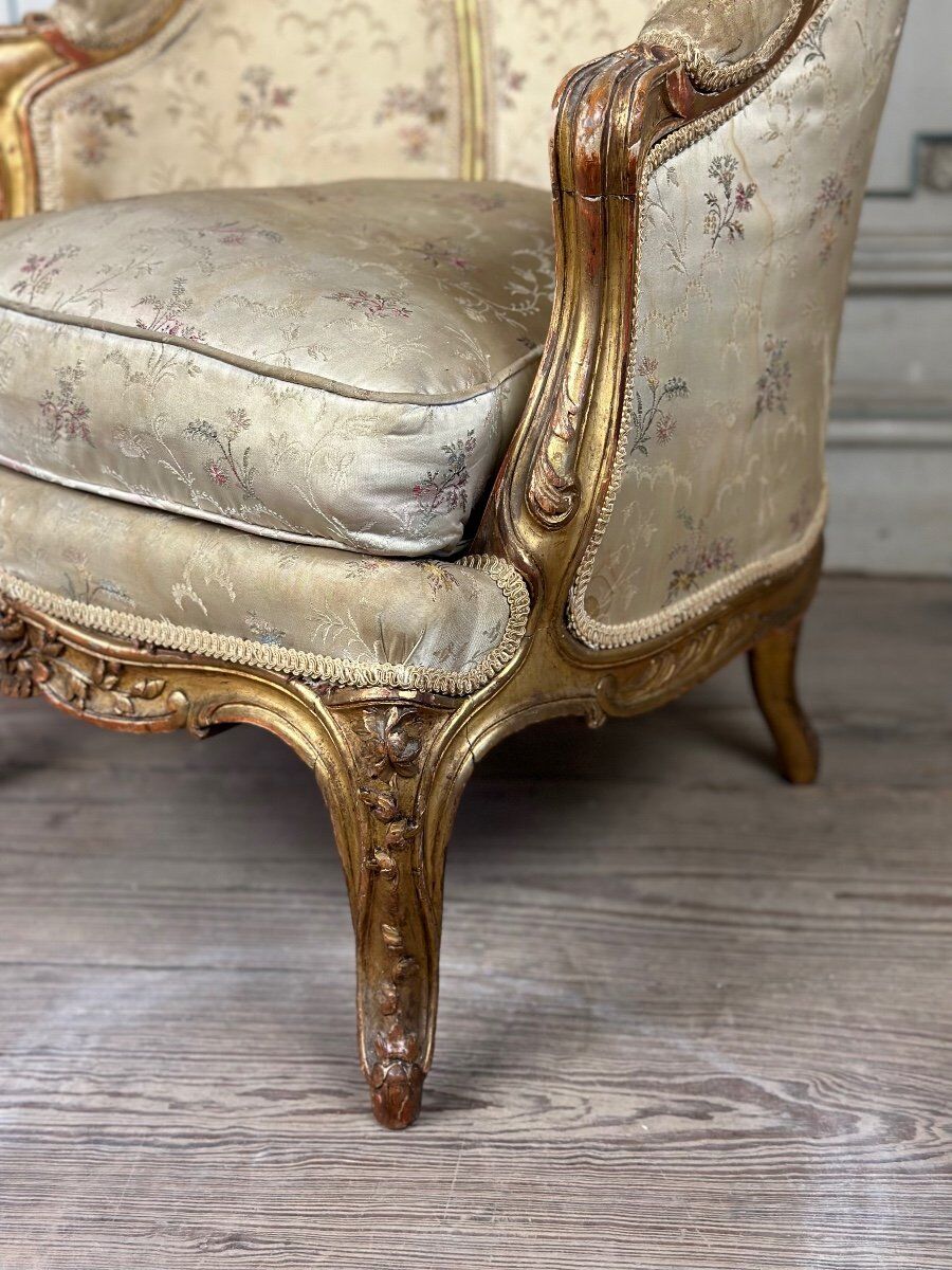 A Louis XV style child's bergère chair in carved and gilded wood, circa 1880