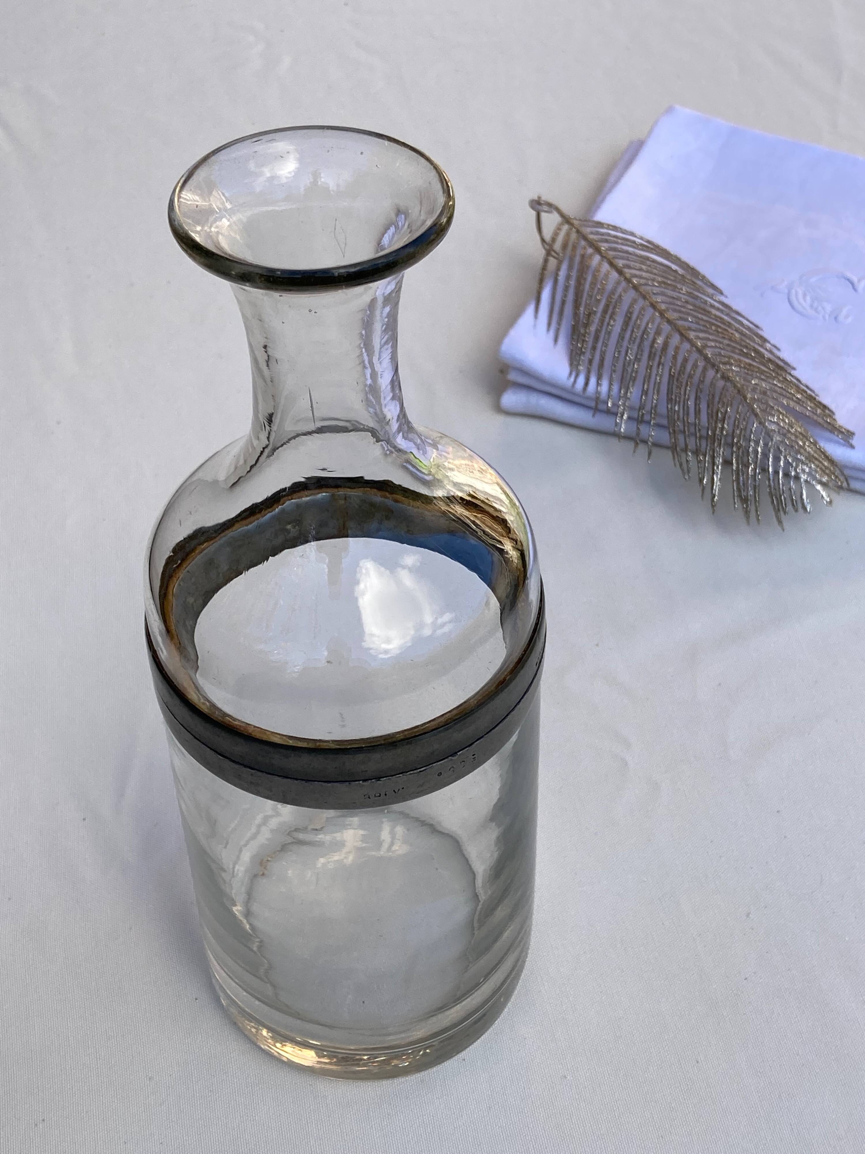 Glass and pewter screw carafe, early 20th century
