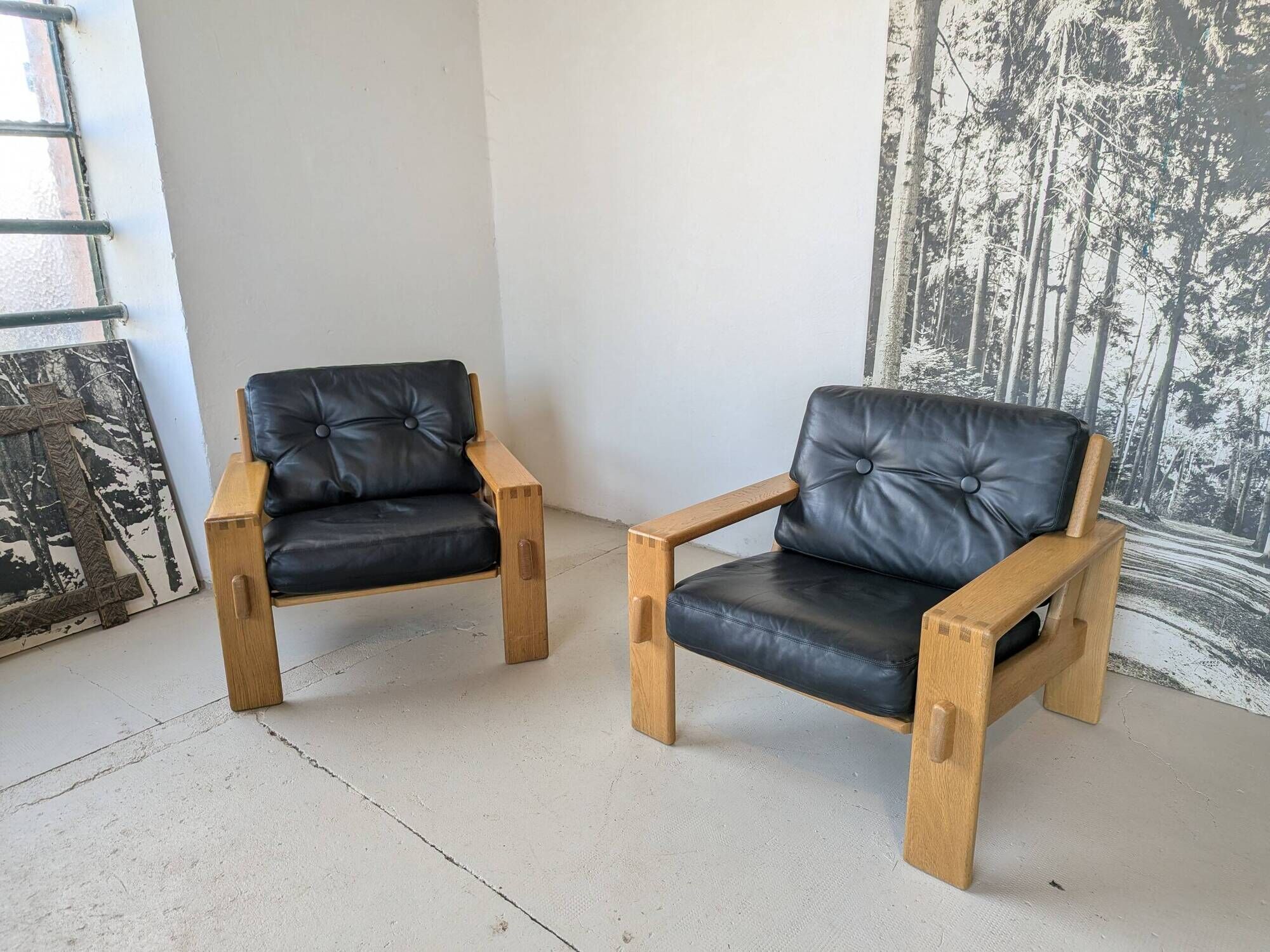 Pair of raw oak and leather armchairs by Esko Pajamies for Asko, Finland.