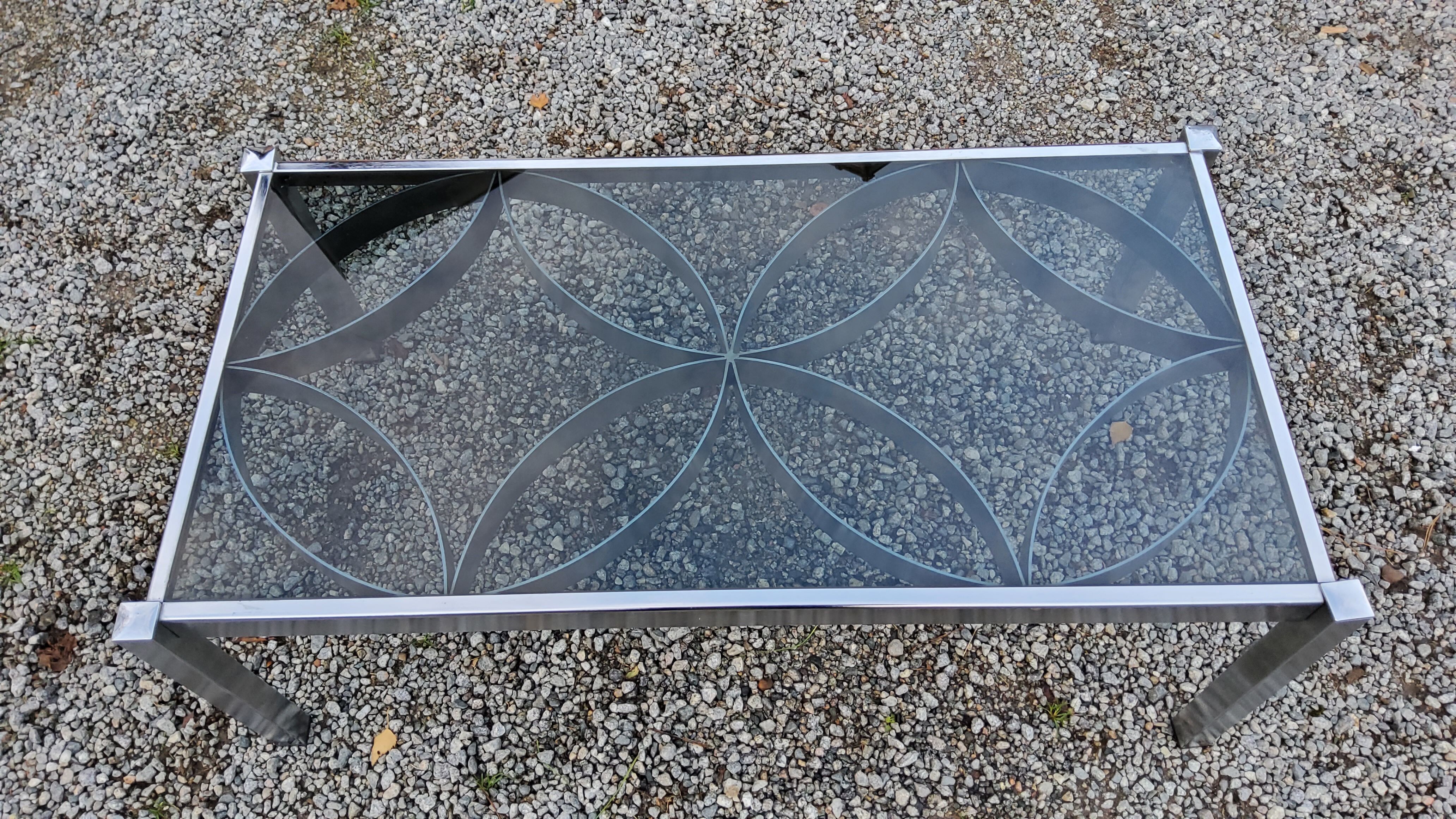 Coffee table from the 70s chrome and smoked glass