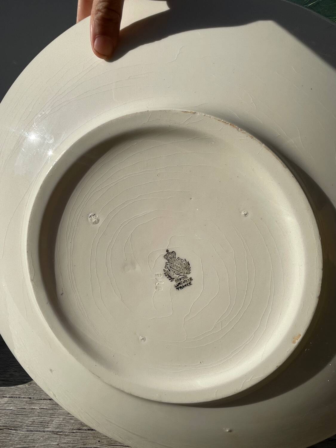 Large white and gold porcelain salad bowl from Lunéville