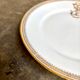 Gold monogrammed porcelain plate "F"