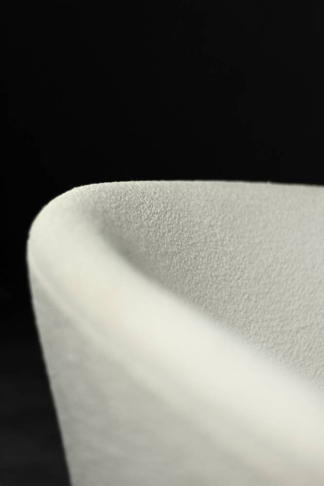 Low oak armchair with modern mid-century Scandinavian fabric and rounded backrest, 1960s.