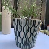 Pot cover with geometric decoration