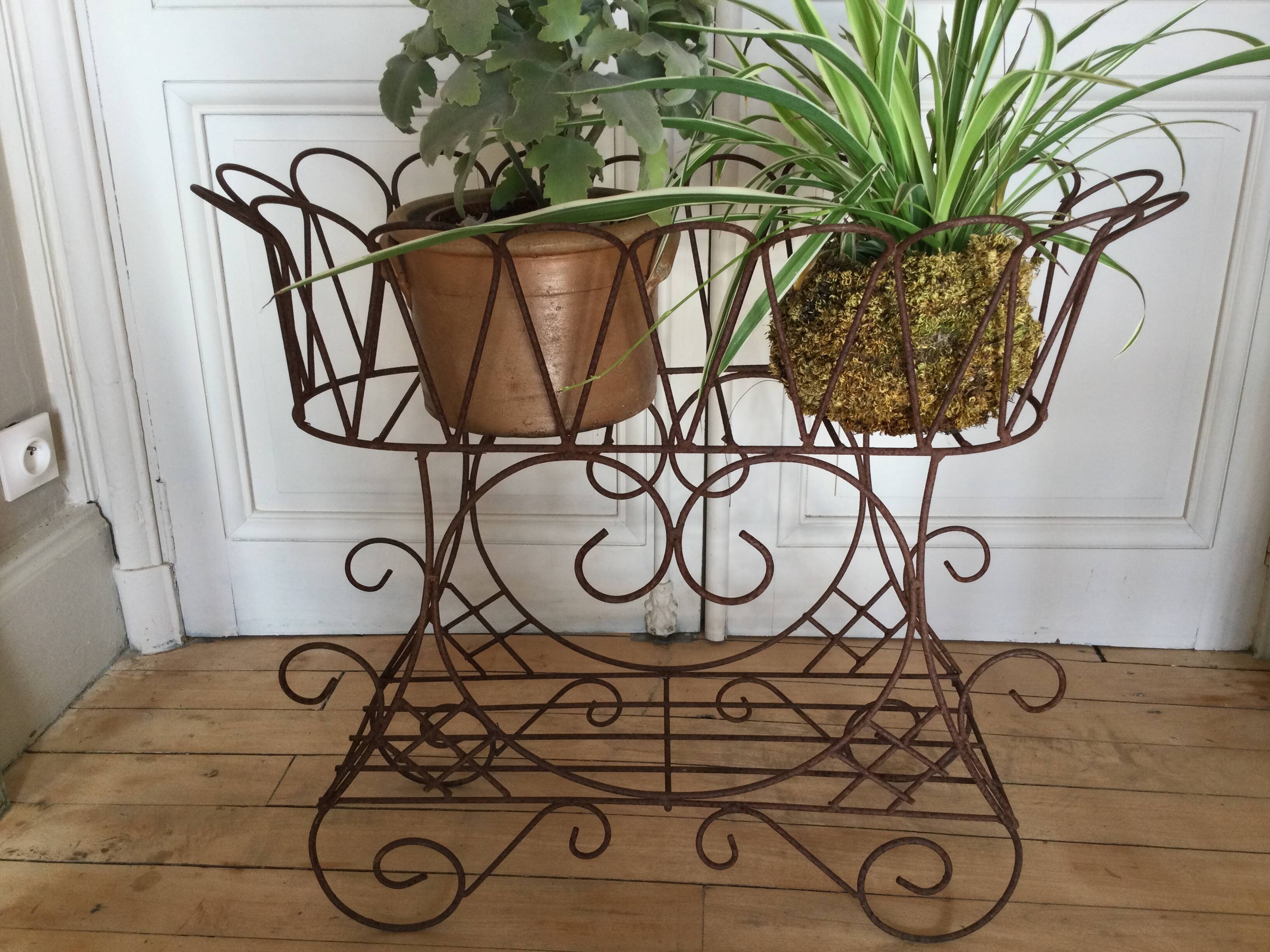 Antique iron plant stand