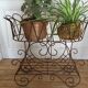 Antique iron plant stand