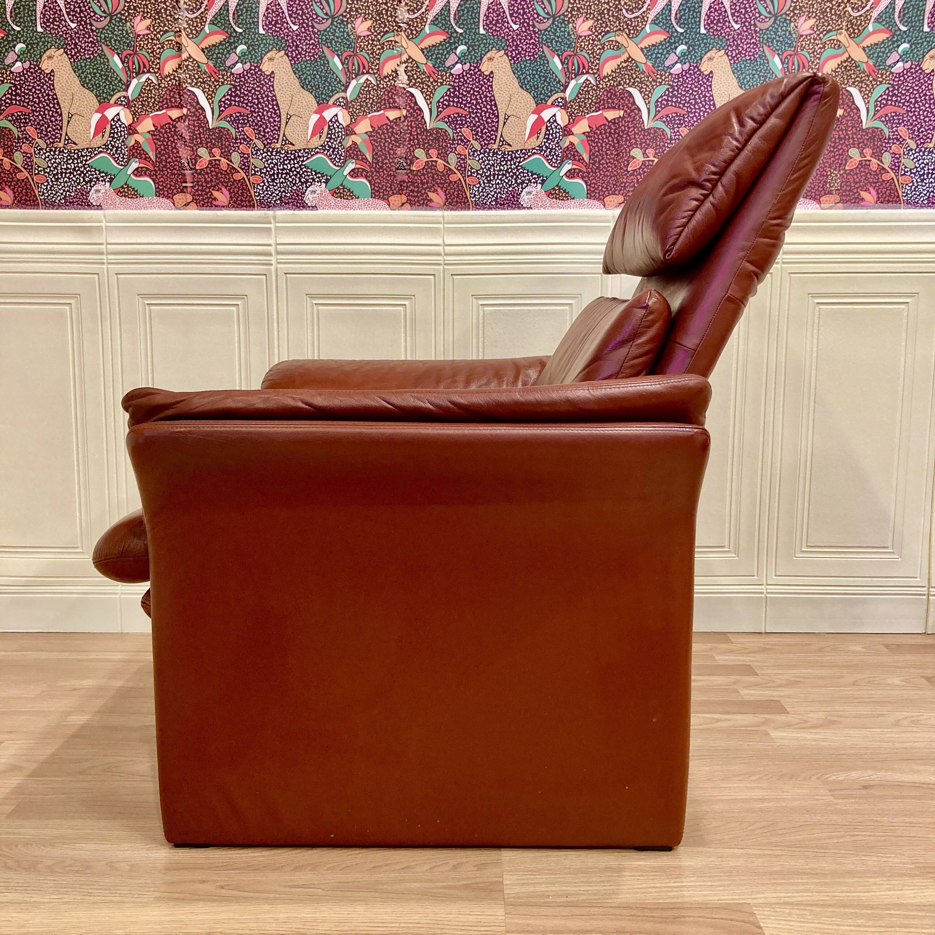 Pair of "Erpo" designer adjustable leather armchairs.