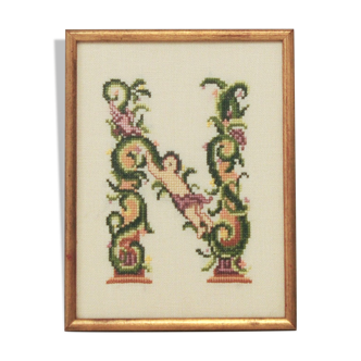 Vintage gold frame embroidered letter N