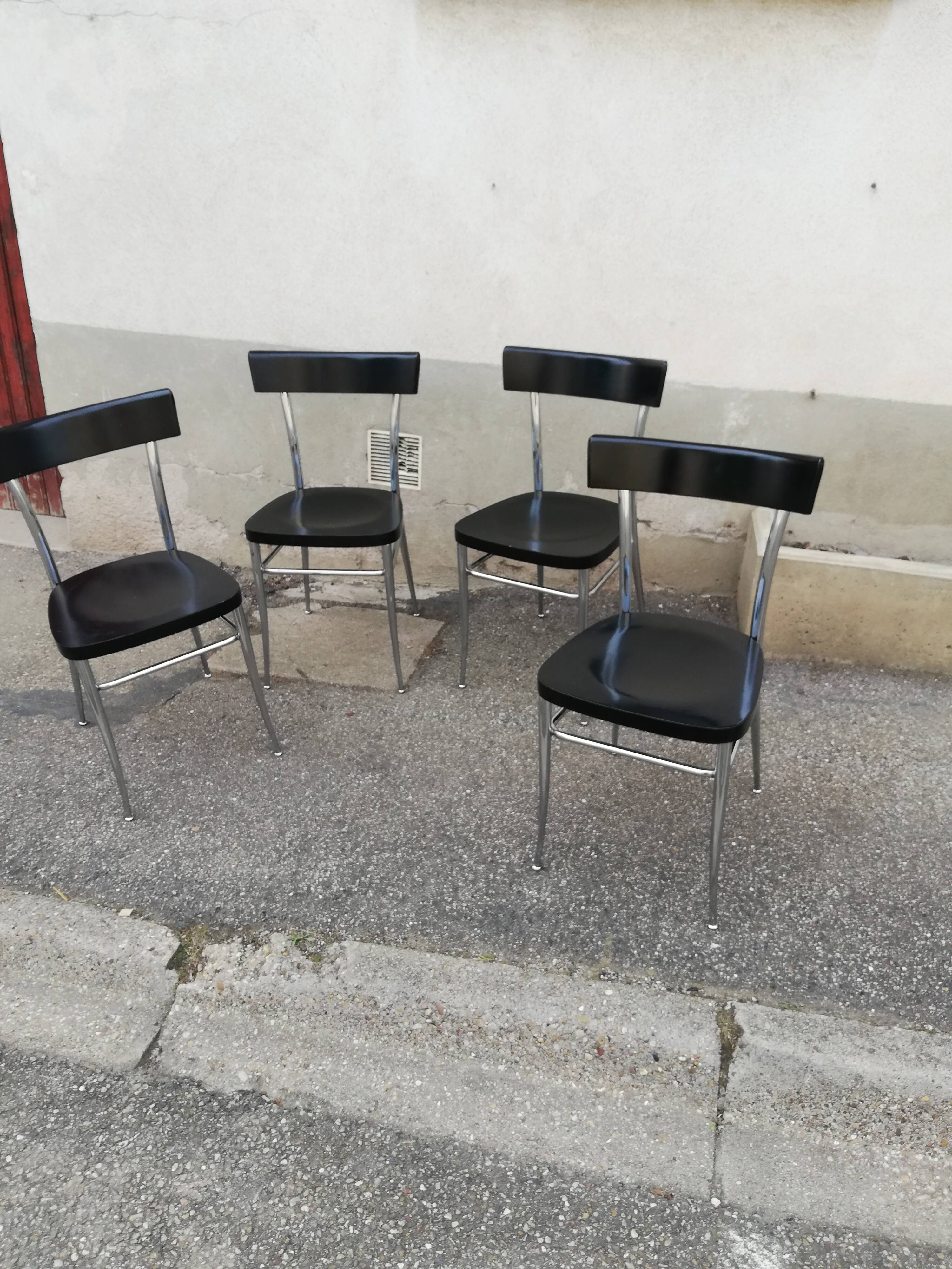 Set of 4 vintage chairs chrome and black wood