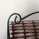 Metal and woven rattan magazine rack from the 60s.