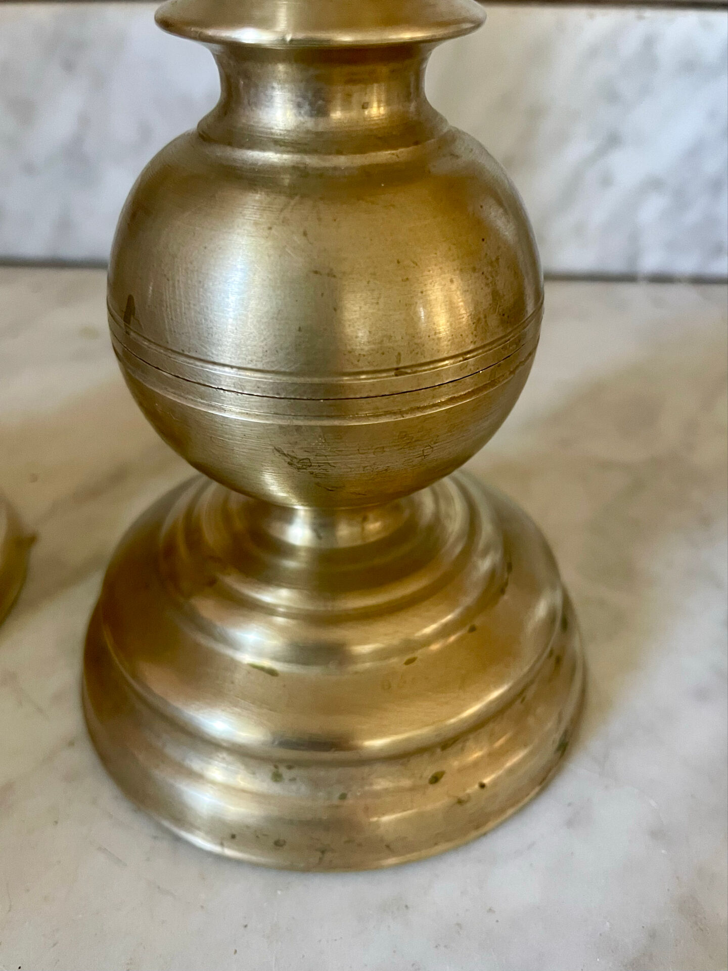 Pair of solid brass candlesticks from the 19th century.