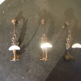 Trio of vintage coat hooks.