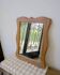 Miroir en bois à cadre chantourné