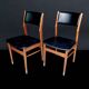 Pair of Scandinavian chairs in wood and black skai
