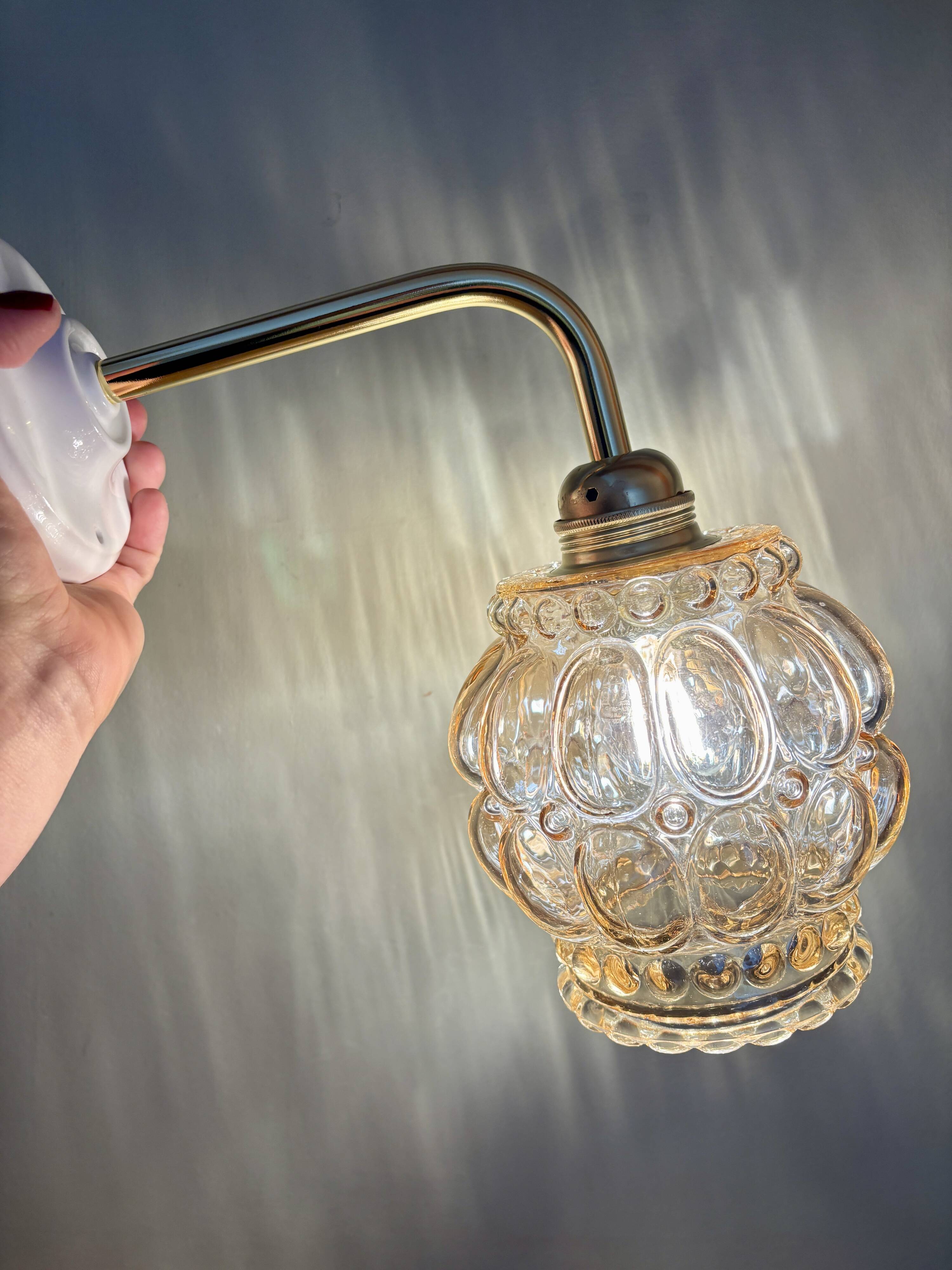 Vintage globe angled wall light in bubbled glass