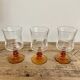 6 small vintage amber stemmed glasses