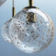 Four gold fleck globe pendants by Doria Germany