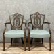 According to George Hepplewhite: pair of 19th century mahogany office armchairs