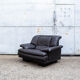 Pair of armchairs in black leather Italy 70s