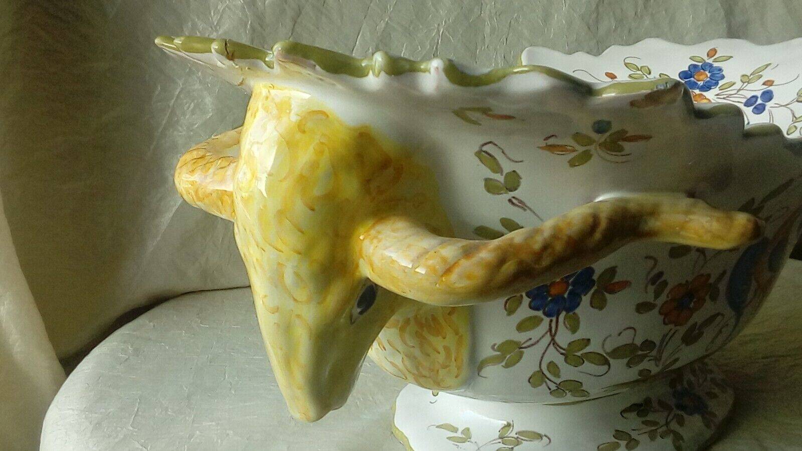 Moustiers earthenware planter with ram's head