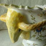 Moustiers earthenware planter with ram's head