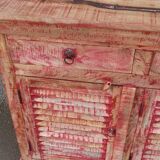 Wooden sideboard with red highlights