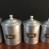 Six aluminum spice pots