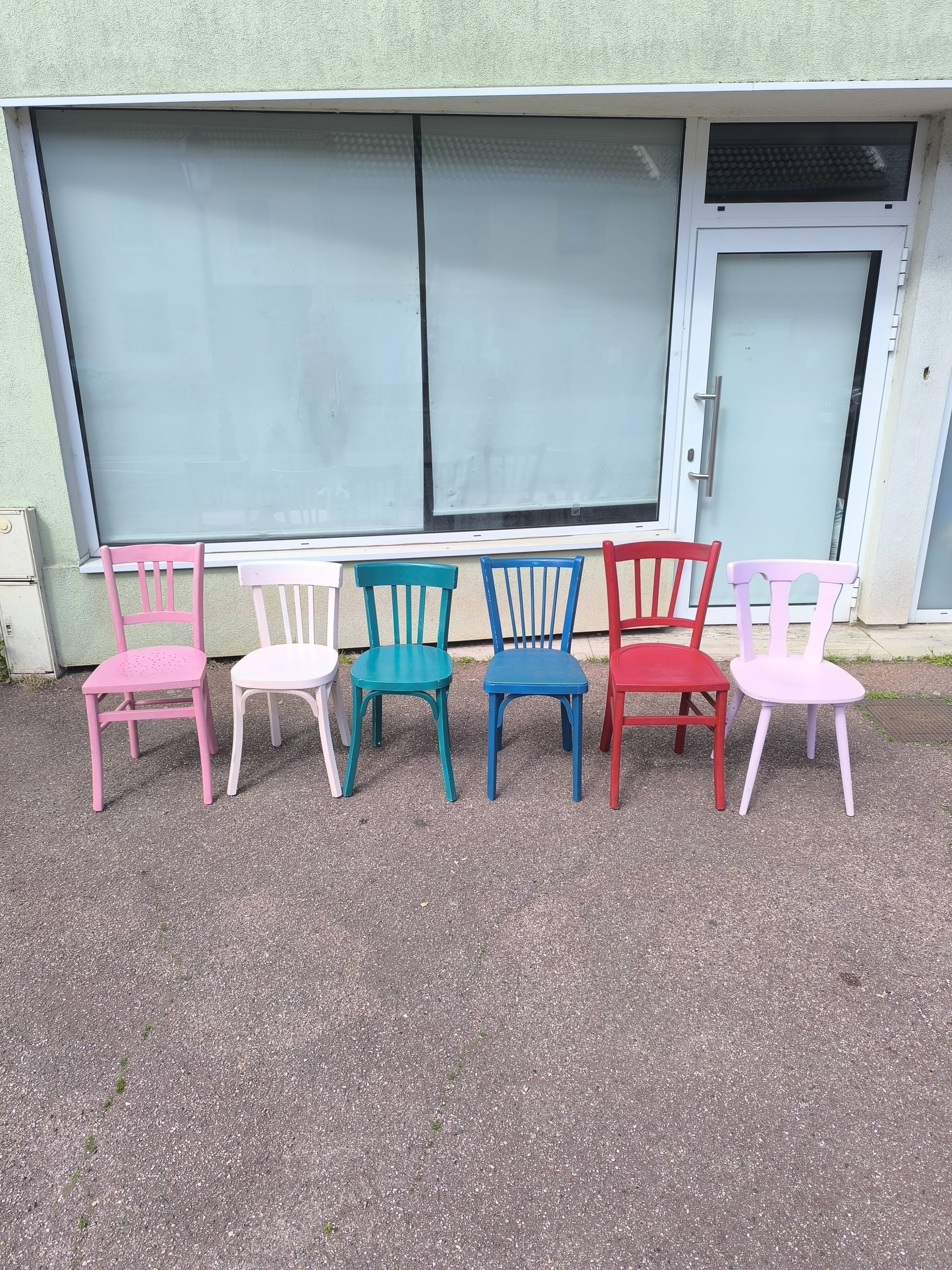 Set of 6 mismatched vintage bistro wooden chairs.