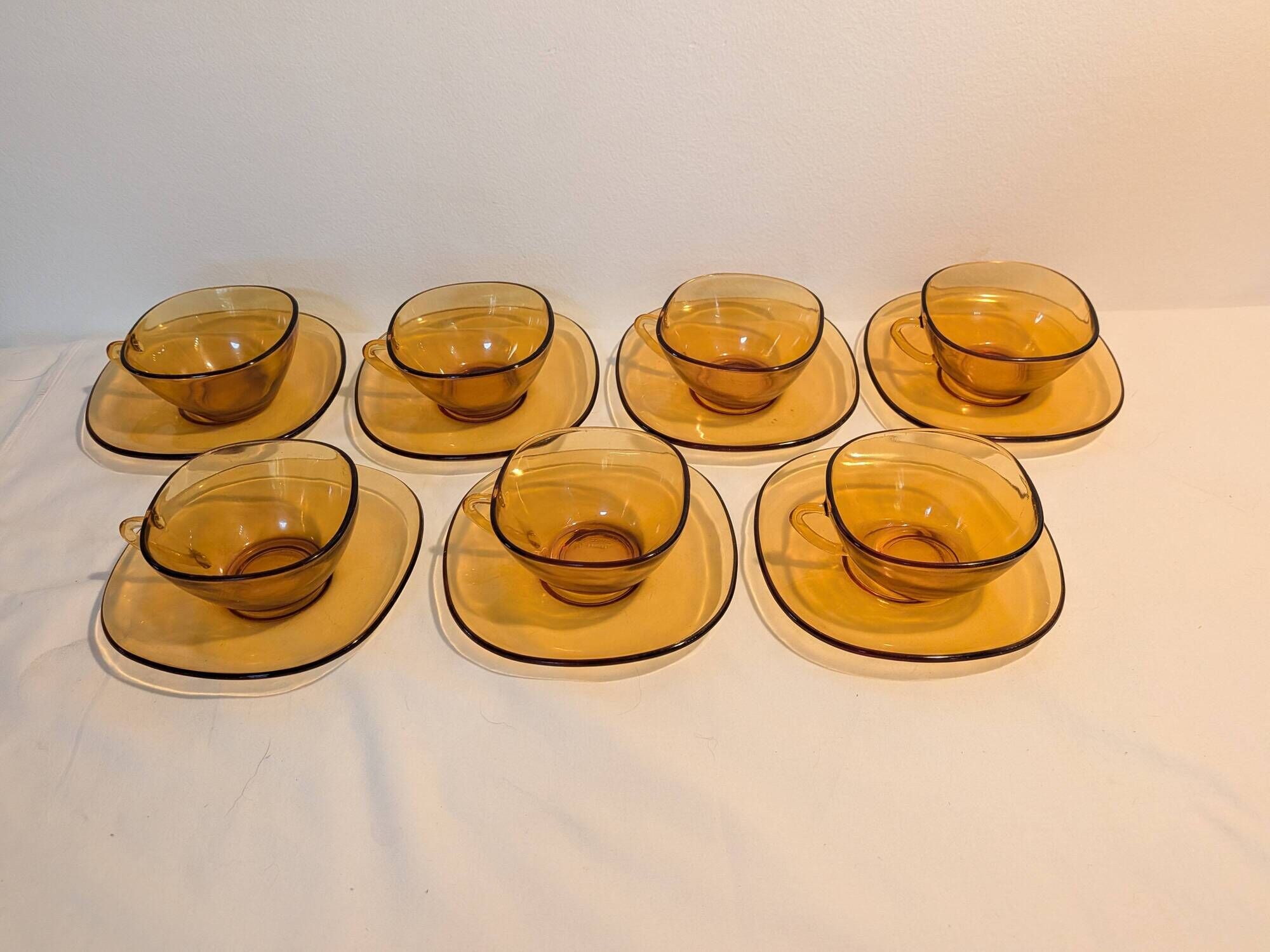 7-cup and saucer set VERECO France in amber glass – 1970s