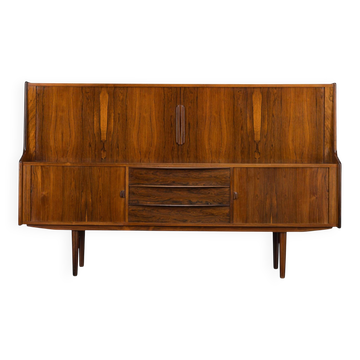 Buffet en palissandre haut avec portes tambour fabriqué par Farstrup, années 1960.