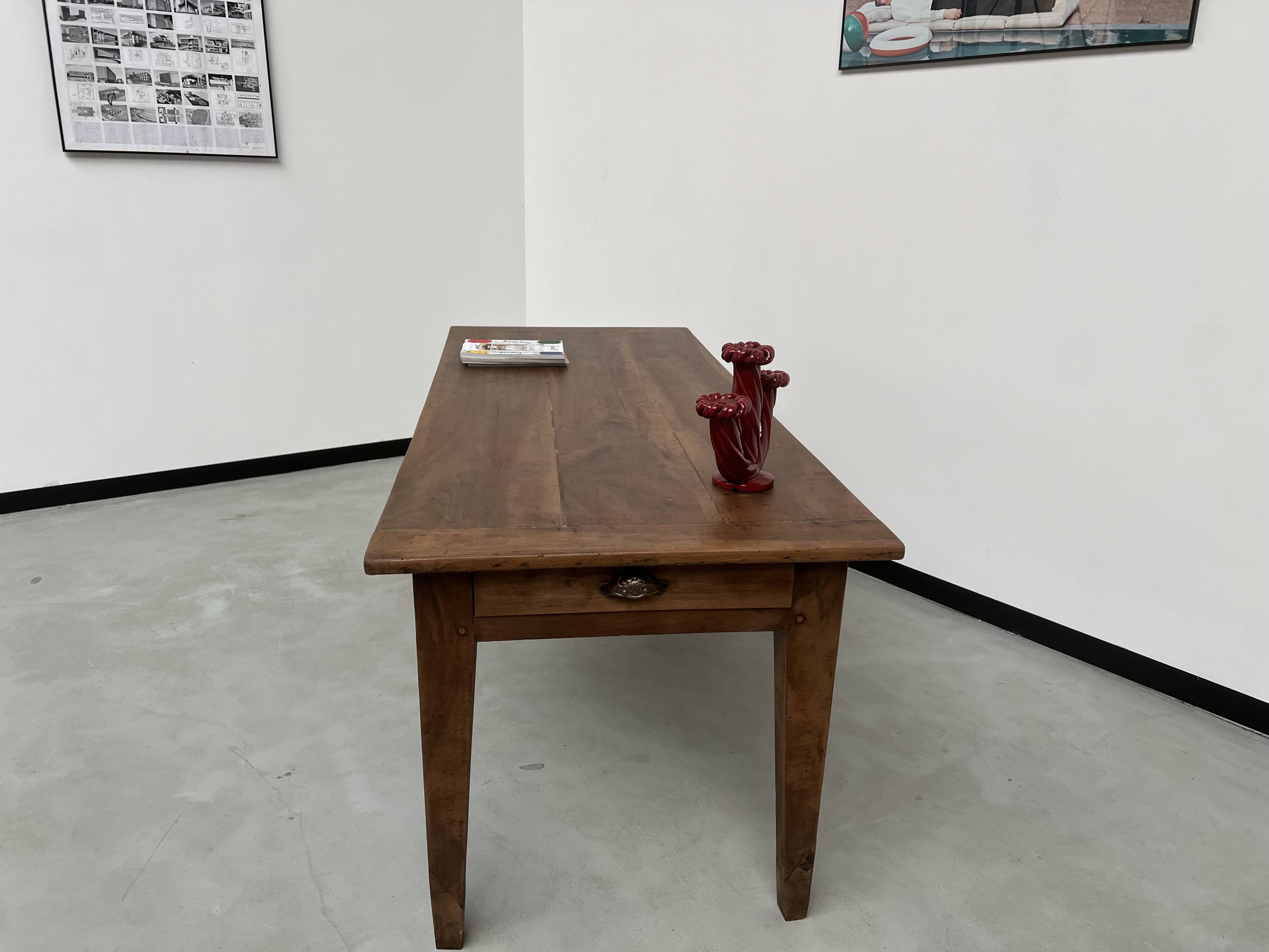 Solid walnut farmhouse table with spindle legs