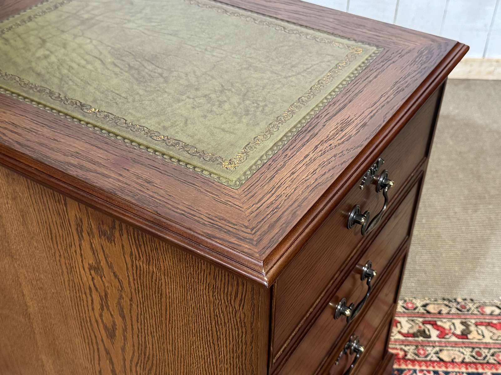 Office cabinet in oak with English leather top from the 1990s.