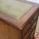 Office cabinet in oak with English leather top from the 1990s.
