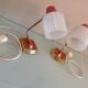Pair of bedside lamps in structured white opaline and brass, vintage 60