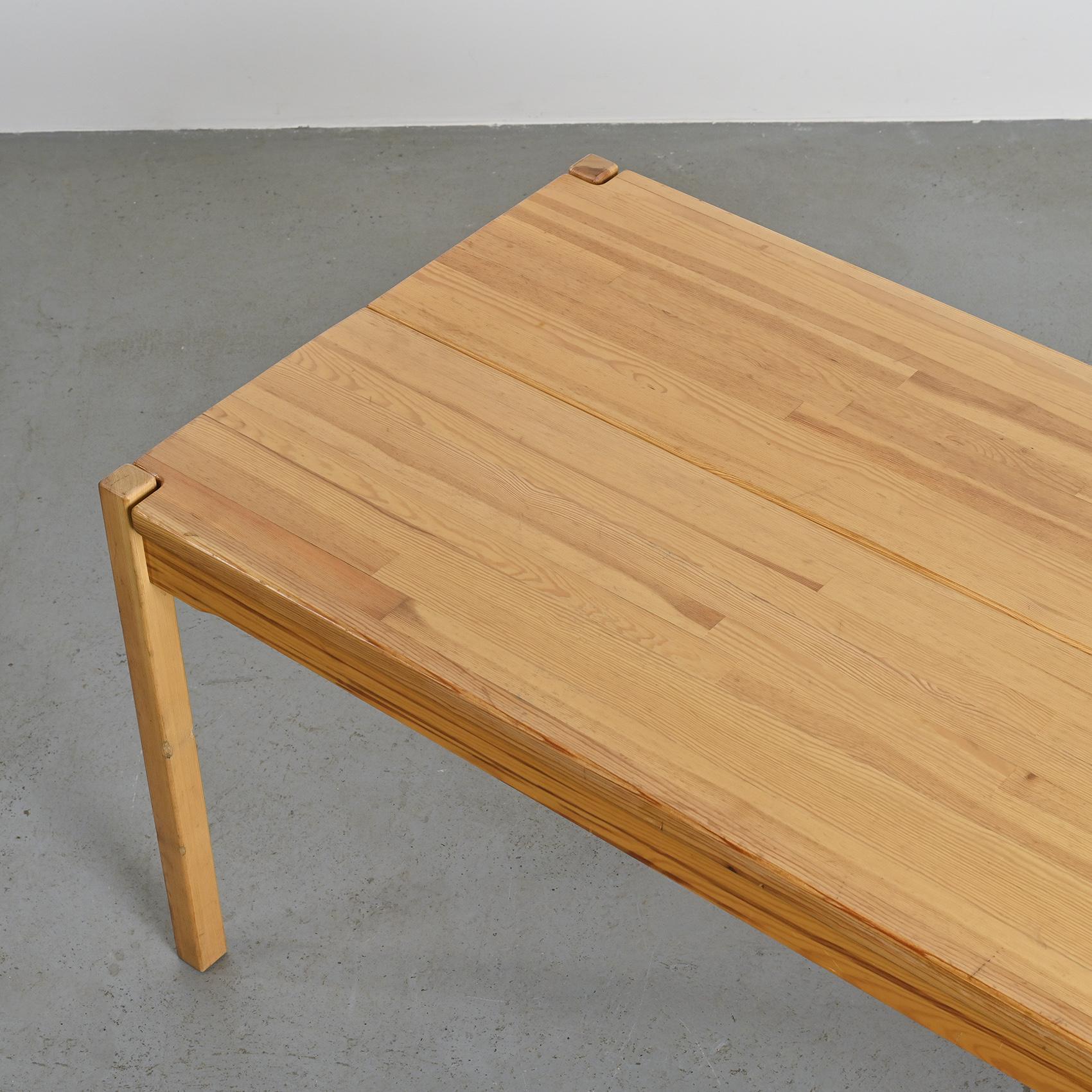 Table and two benches set in solid elm, France, circa 1980