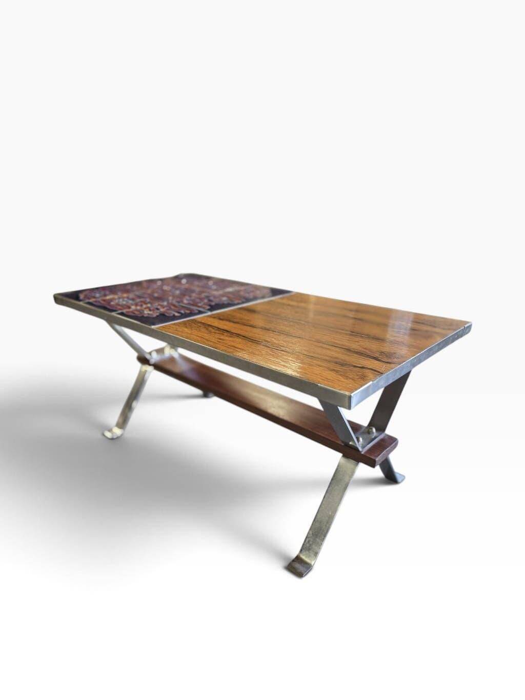 Vintage chrome coffee table with ceramic accent.