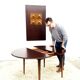 Danish round dining table in rosewood – 1950s design with butterfly extension.