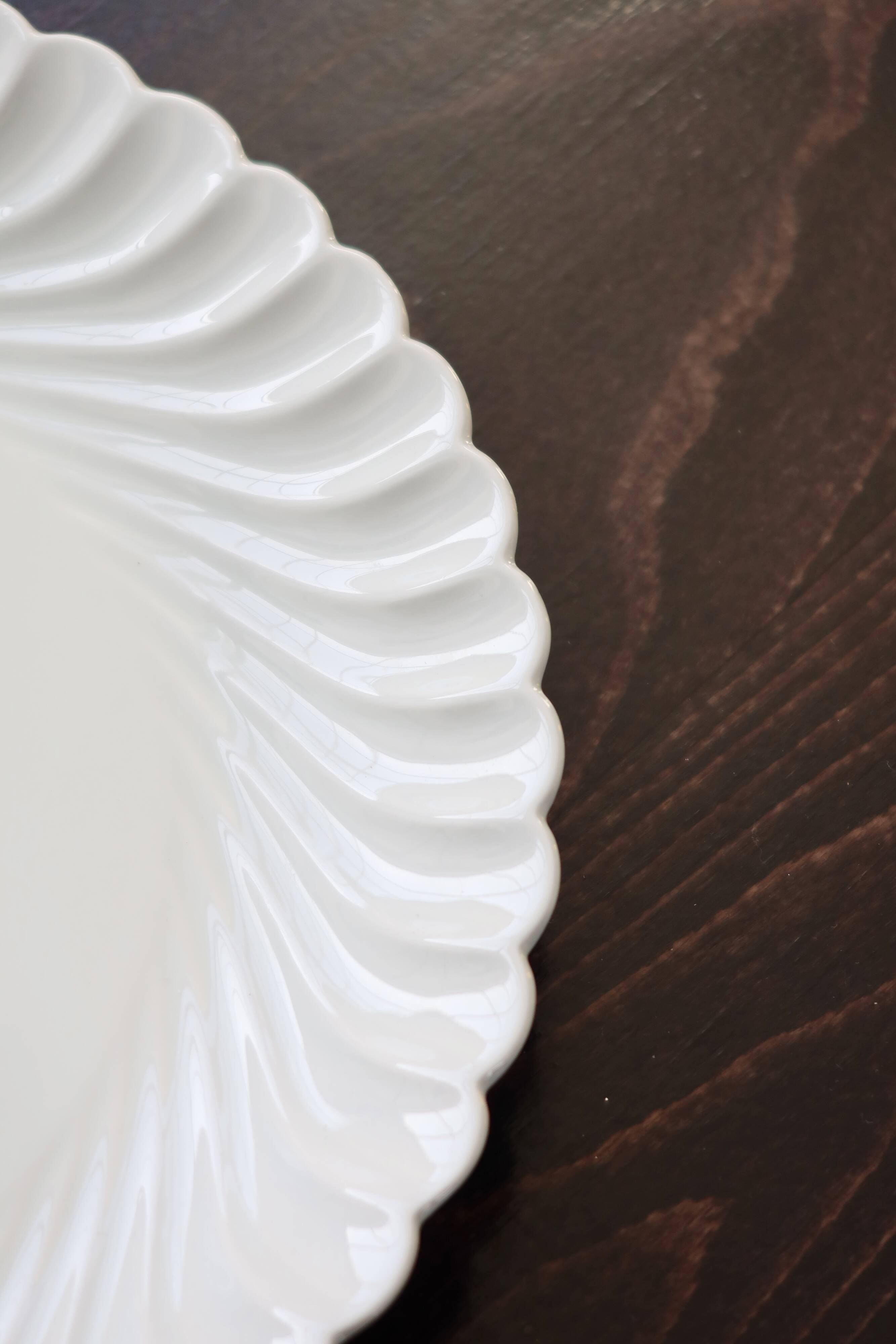 Vintage round serving dish in white porcelain with twists by Limoges Haviland