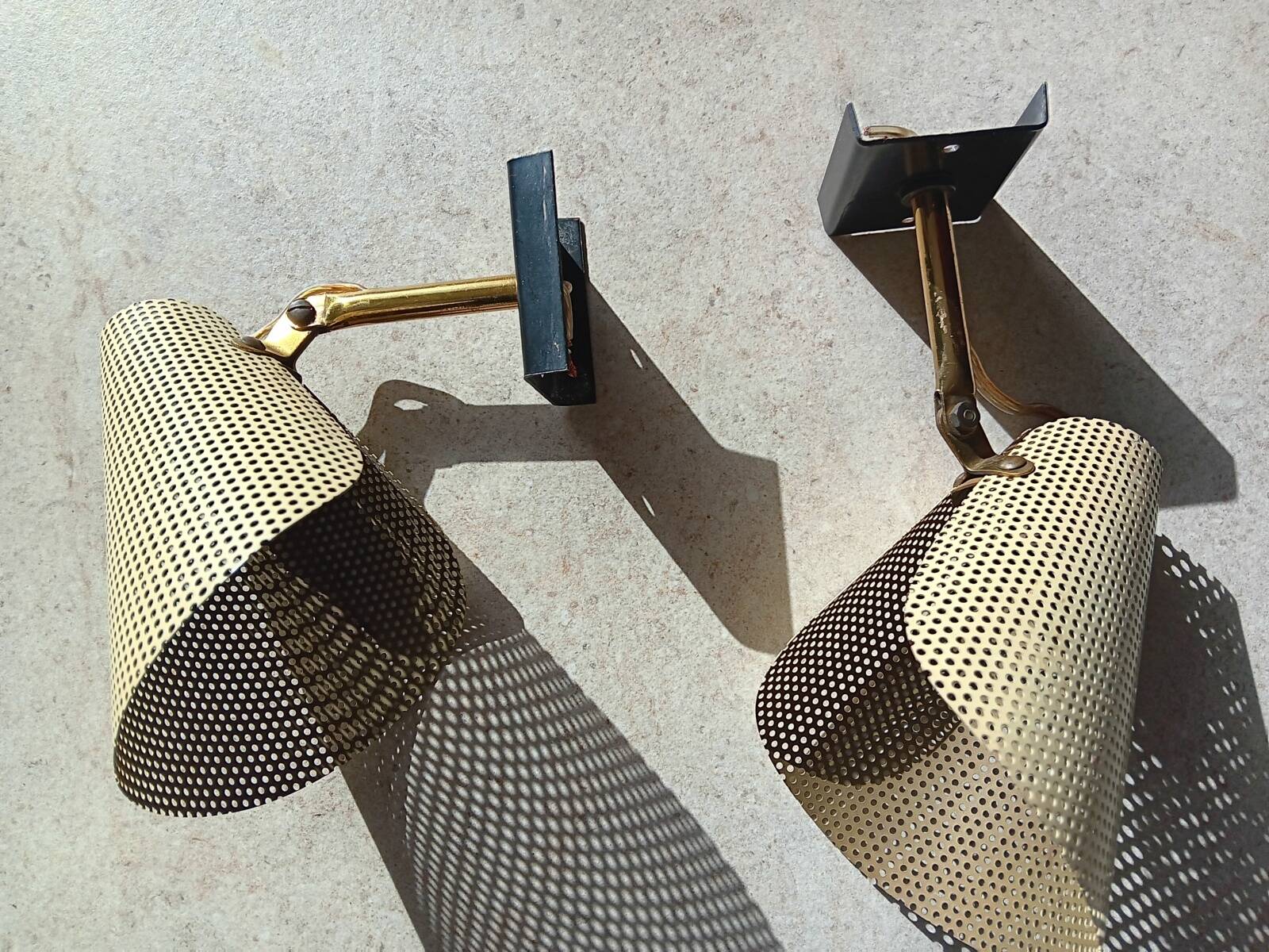 Pair of perforated metal horn wall lights