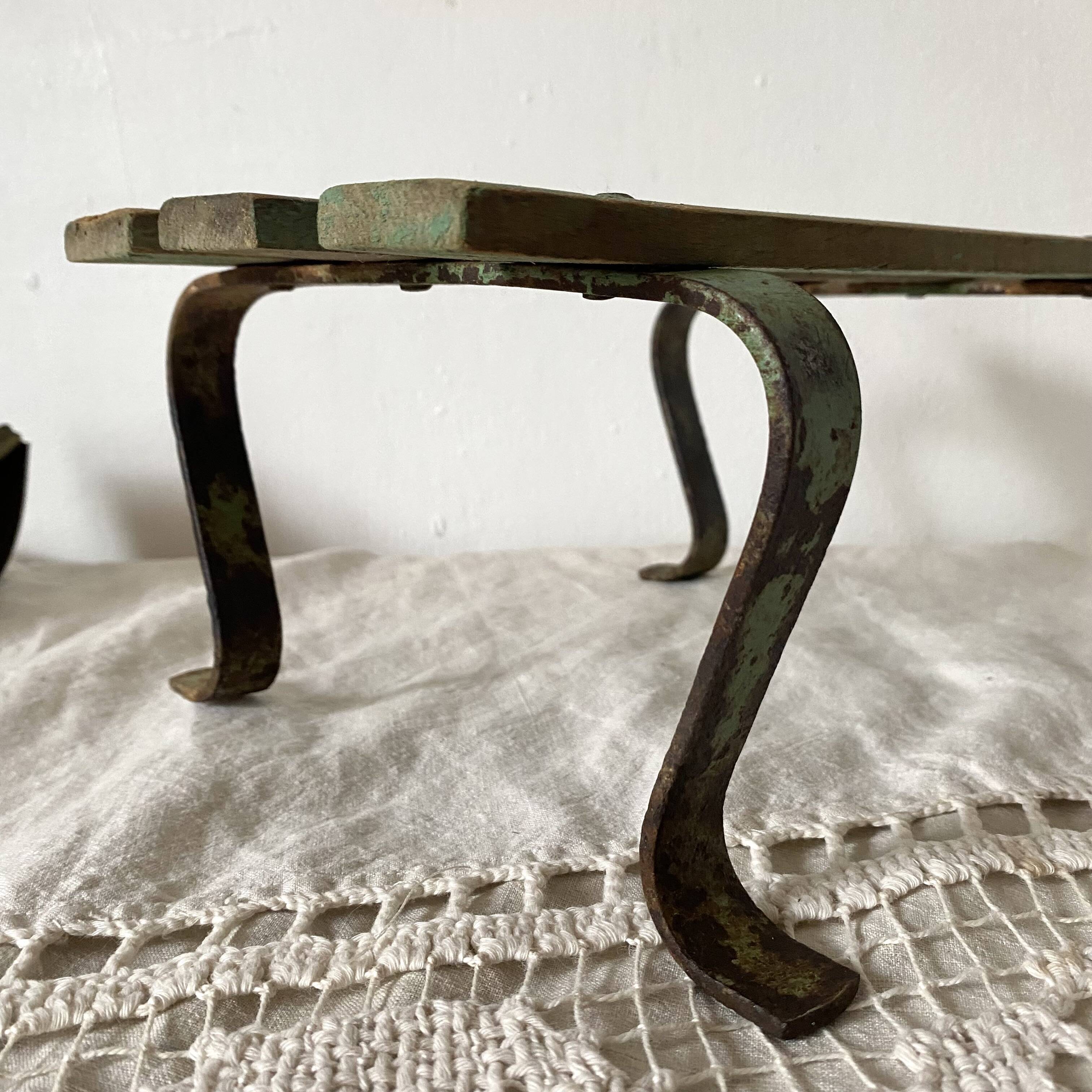 Low stool with wooden and metal slats