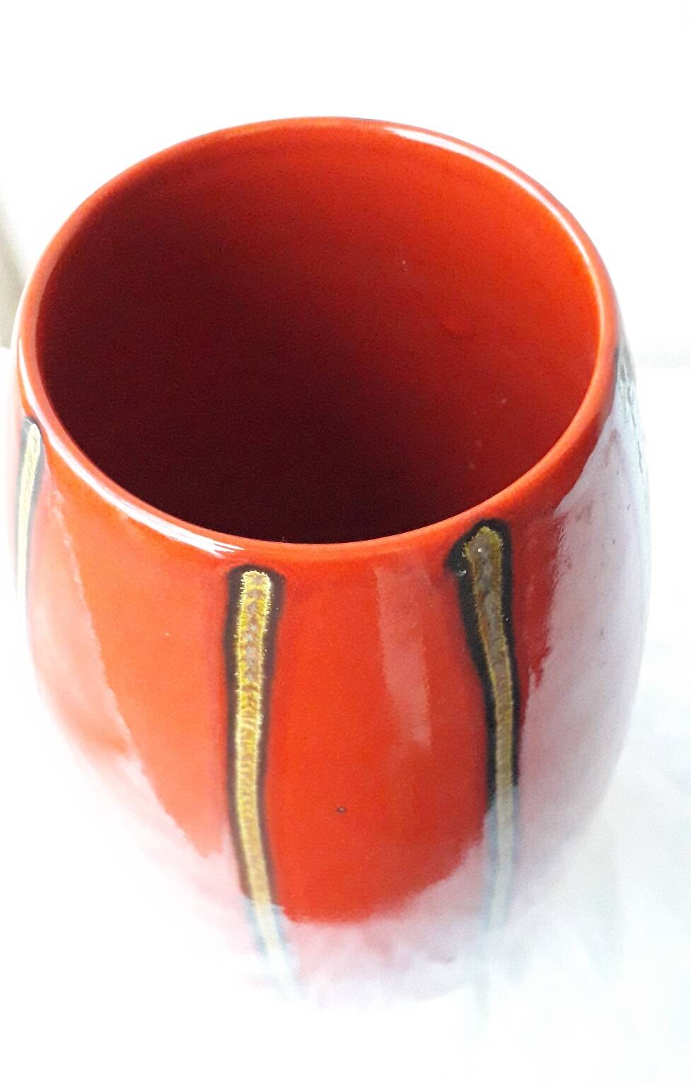 Red ceramic vase