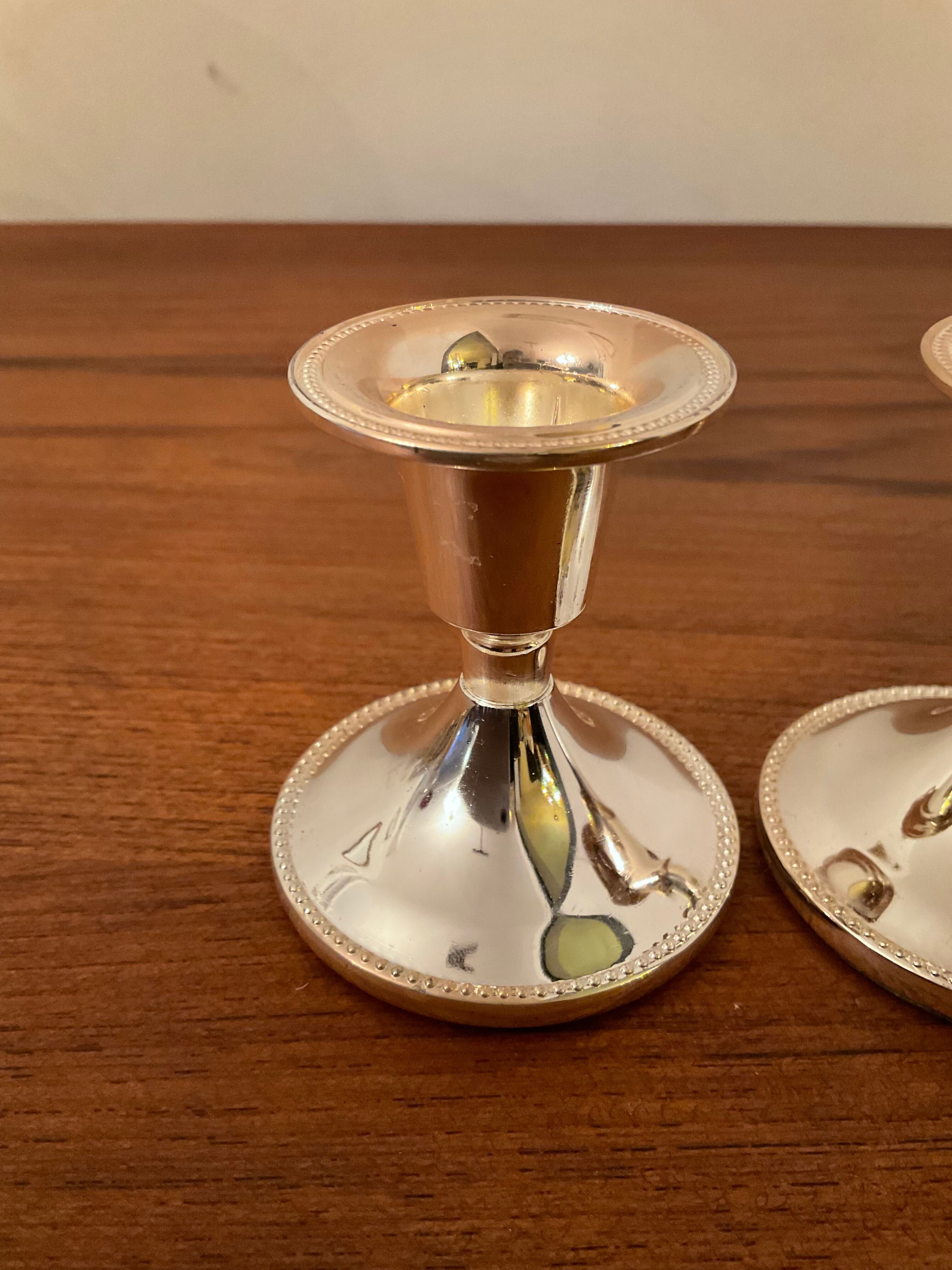 Pair of vintage silver metal candle holders