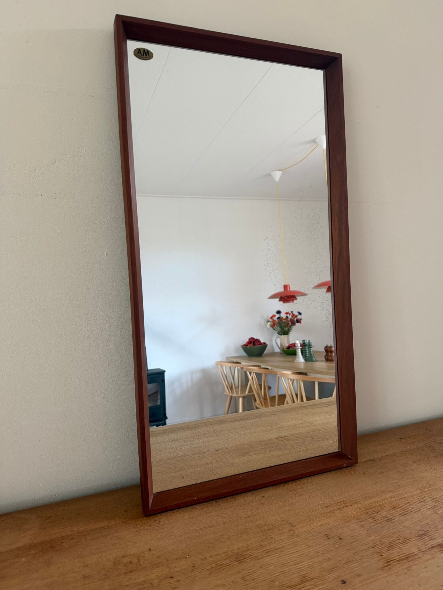 Beautiful vintage Danish teak mirror with mittered edges and nice brass det